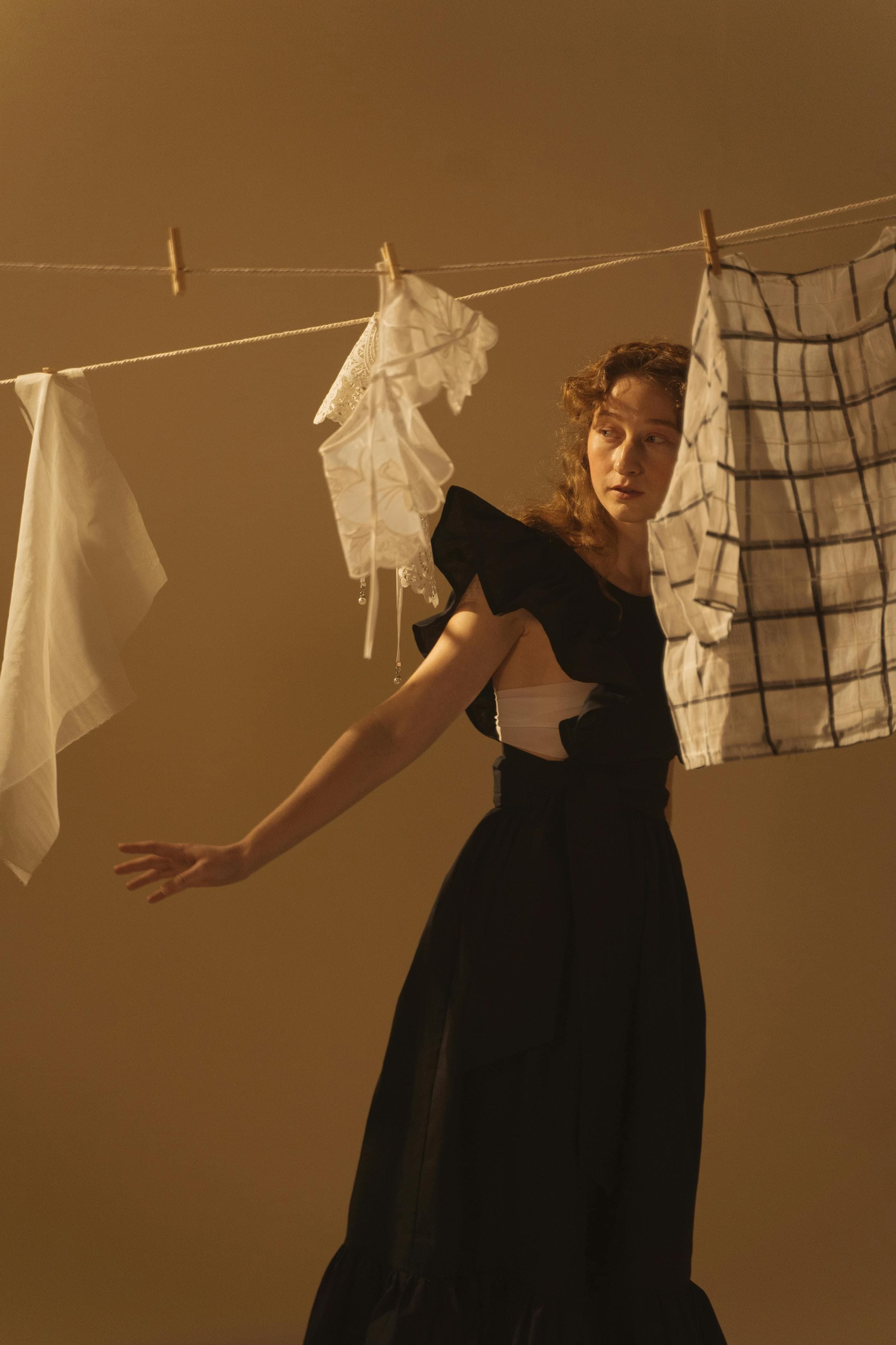 A linen sheet hung to dry, catching the afternoon light in a Tangier courtyard.